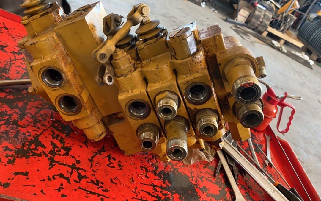 REVISIONE DISTRIBUTORE DOZER CAT D6